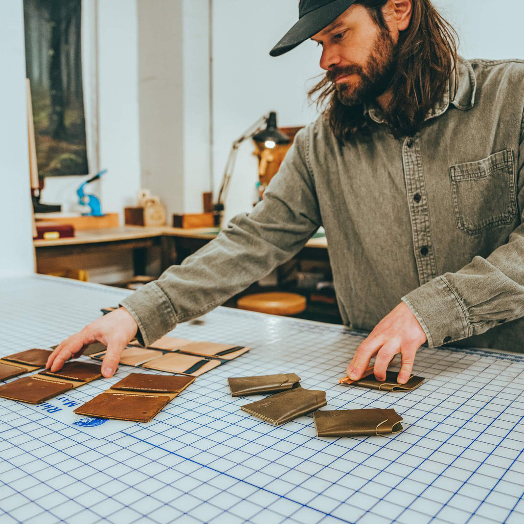 Jeff Curry assembling wallets for Dark Forest