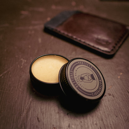 Detail shot of Leather Balm tin by Dark Forest