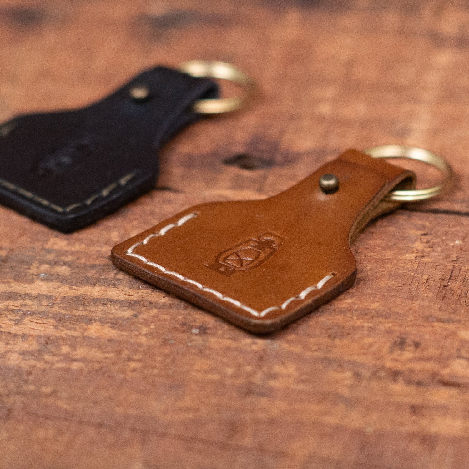 Detail shot of Apple AirTag Keychain in Black & Walnut