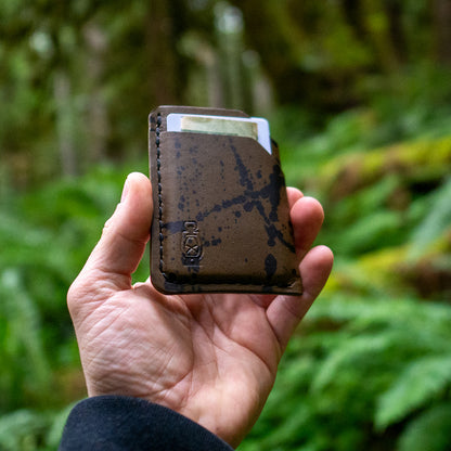 Forest vibes with the Rustler Splatter Wallet in Chocolate Splatter Leather by Dark Forest