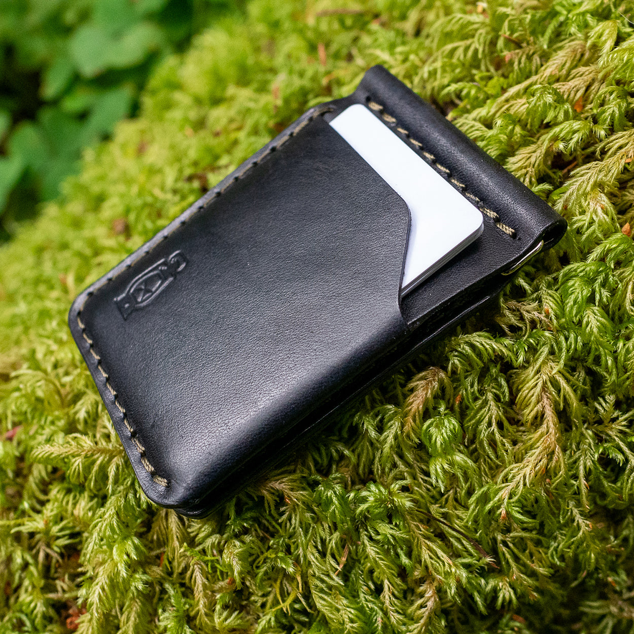 Detail of the Rustler Billfold in Black Leather by Dark Forest