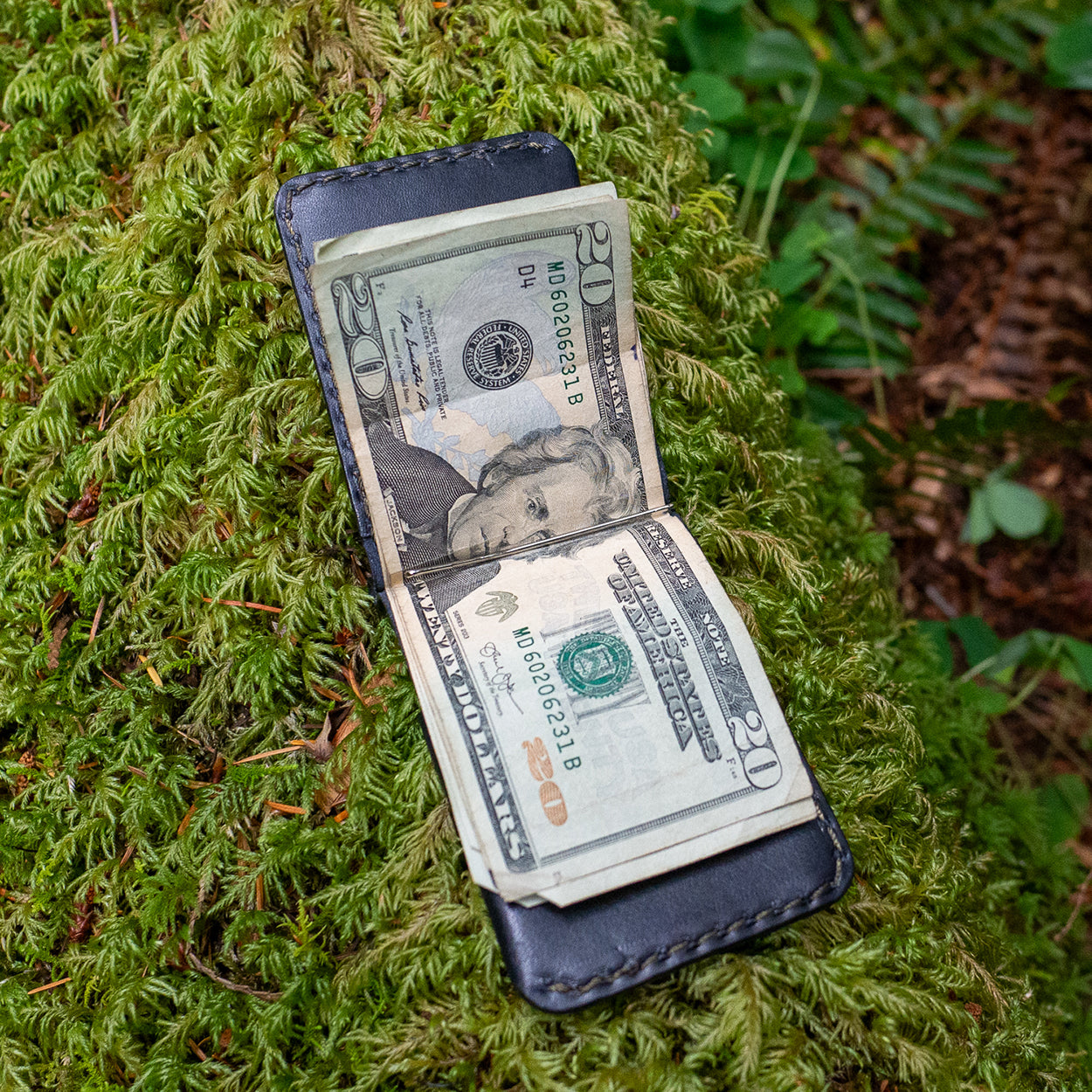 Rustler Billfold in Black Leather by Dark Forest with money detail