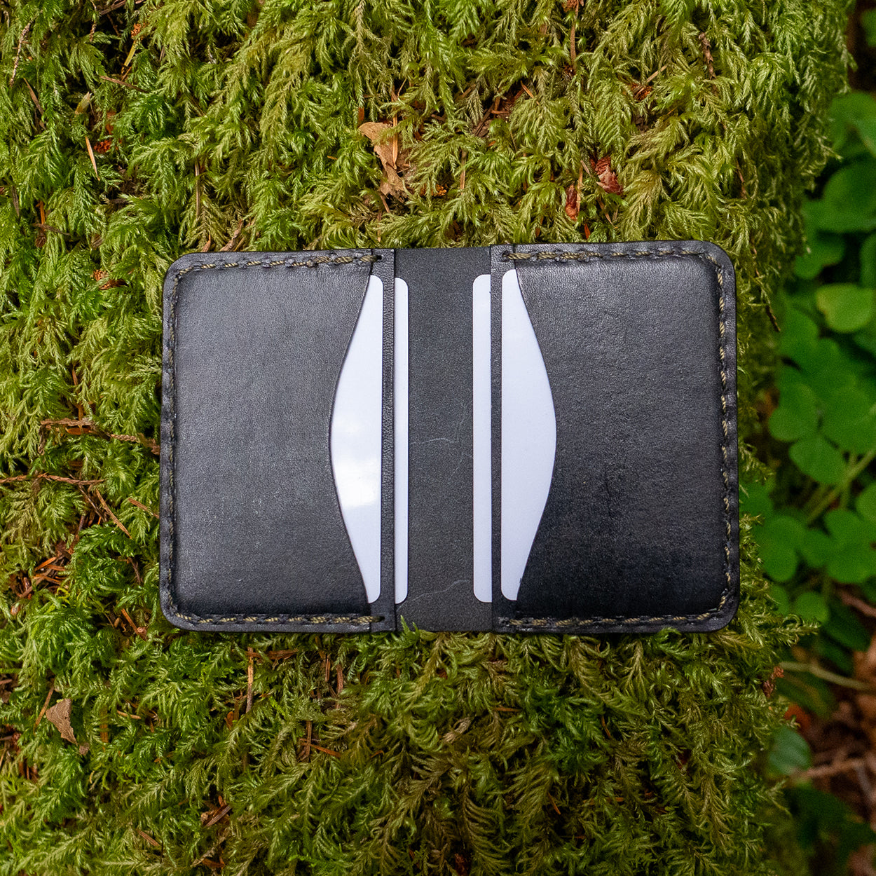 Detail of the Rangeland Mini Wallet in Black Leather by Dark Forest