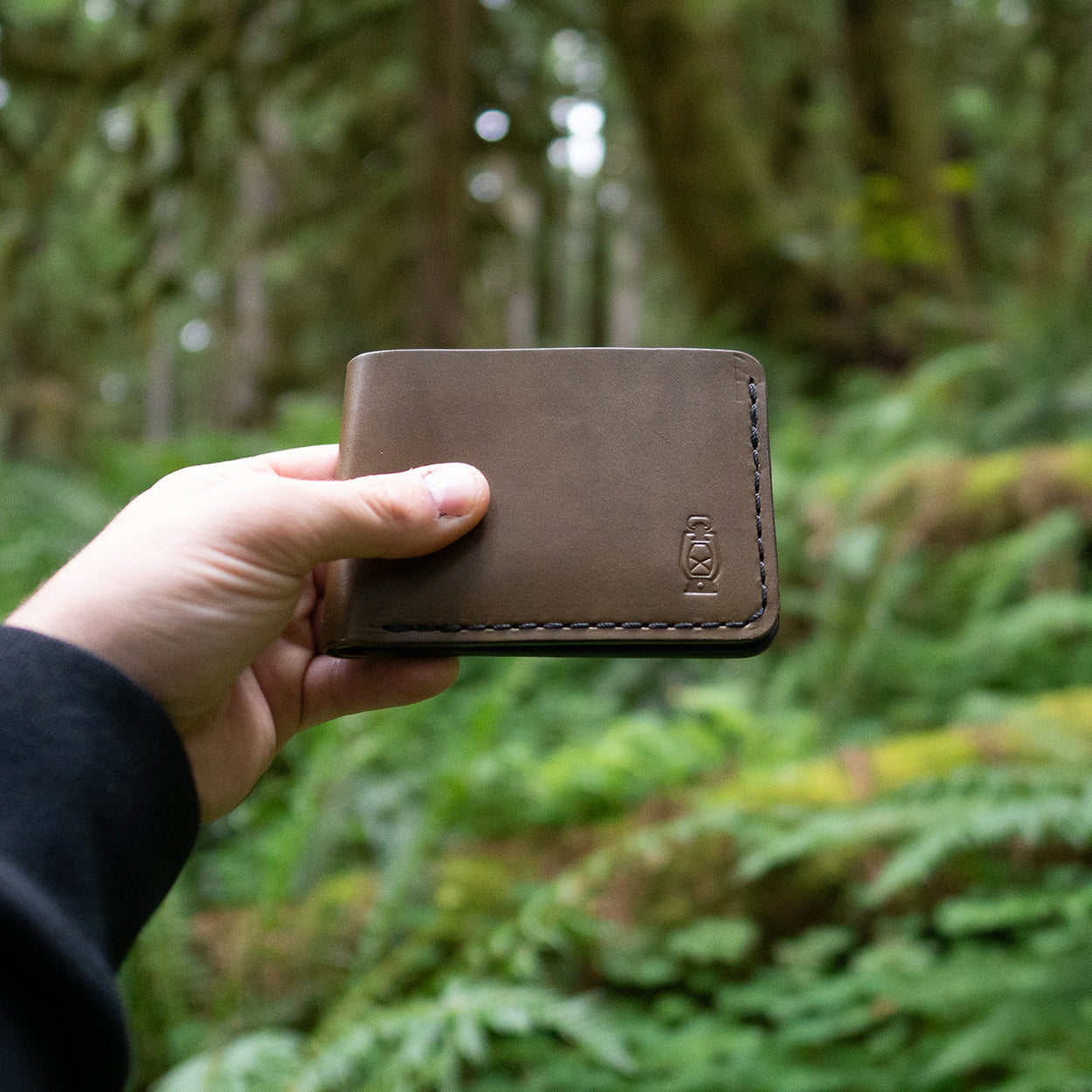 Out in the woods with the Wrangler Two Tone Wallet in Olive / Black Leather by Dark Forest